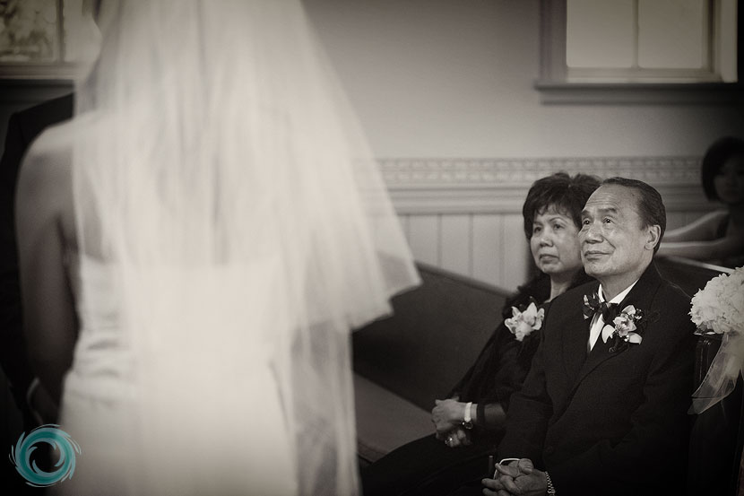 father-of-the-groom-looks-on-at-the-ceremony
