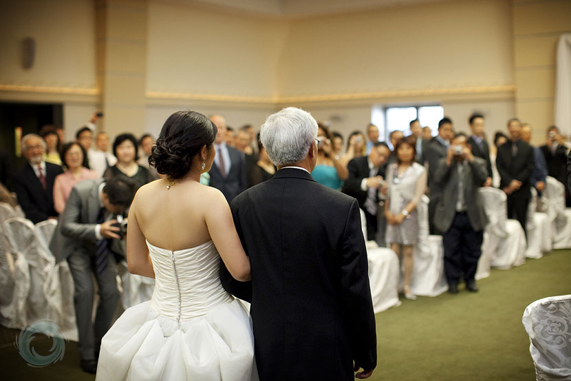 00A-Chinese bride is walked down the aisle by her father