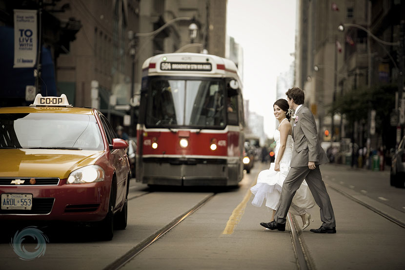 25-wedding pic downtown in toronto with streetcar and taxi