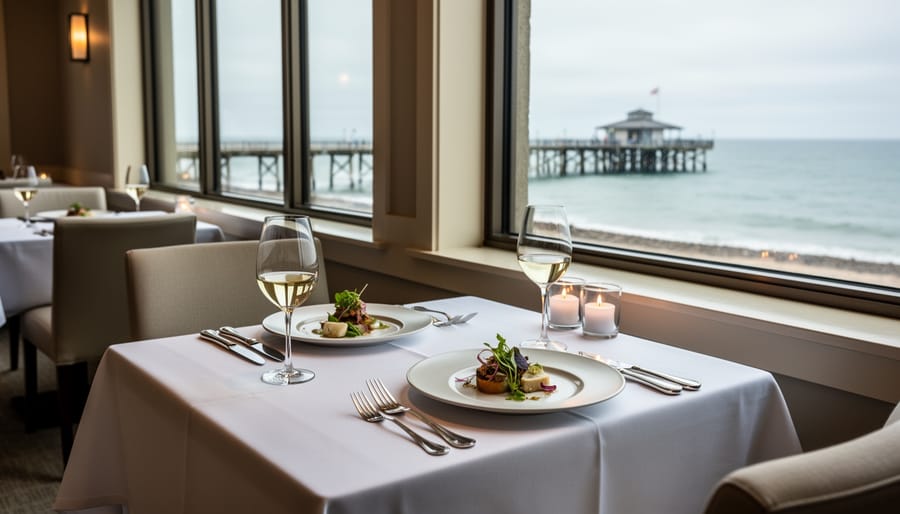 Intimate wedding dining table at The Shore Pier with tasting plates and a blurred view of the pier through the window.